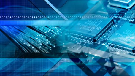 Fotografía de detalle de chips y fibra óptica que sirve de ilustración para el artículo